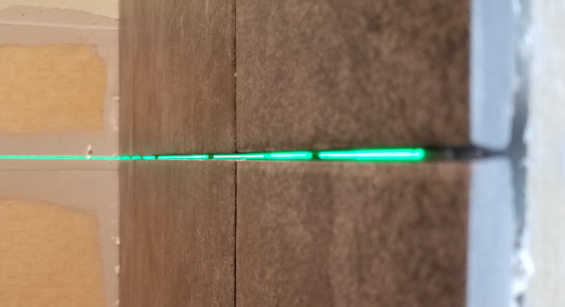 Level check. Not bad for 18" American made tiles that are not rectified